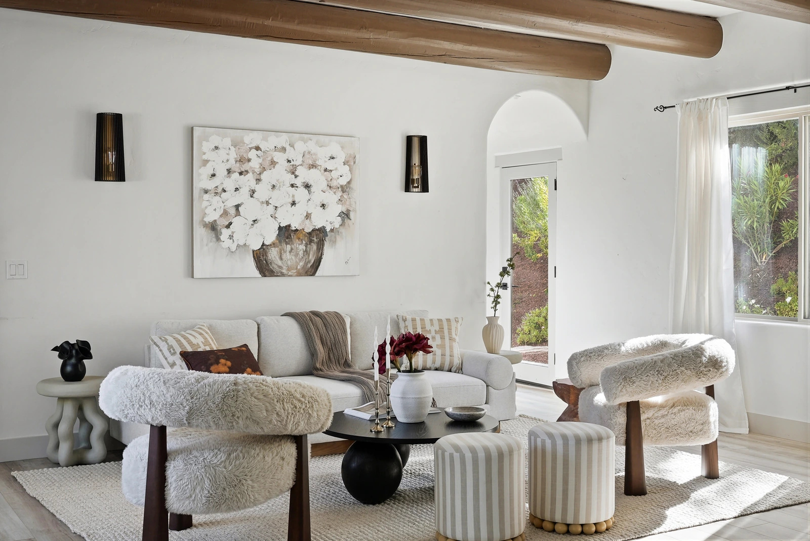 Bright contemporary living room with sculptural lounge chairs